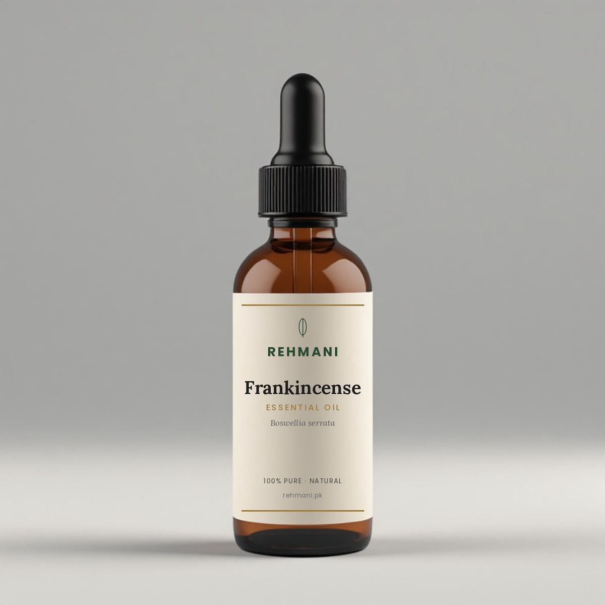 Rehmani Frankincense Essential Oil in an amber glass dropper bottle