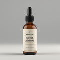 Rehmani Sweet Almond Oil in an amber glass dropper bottle