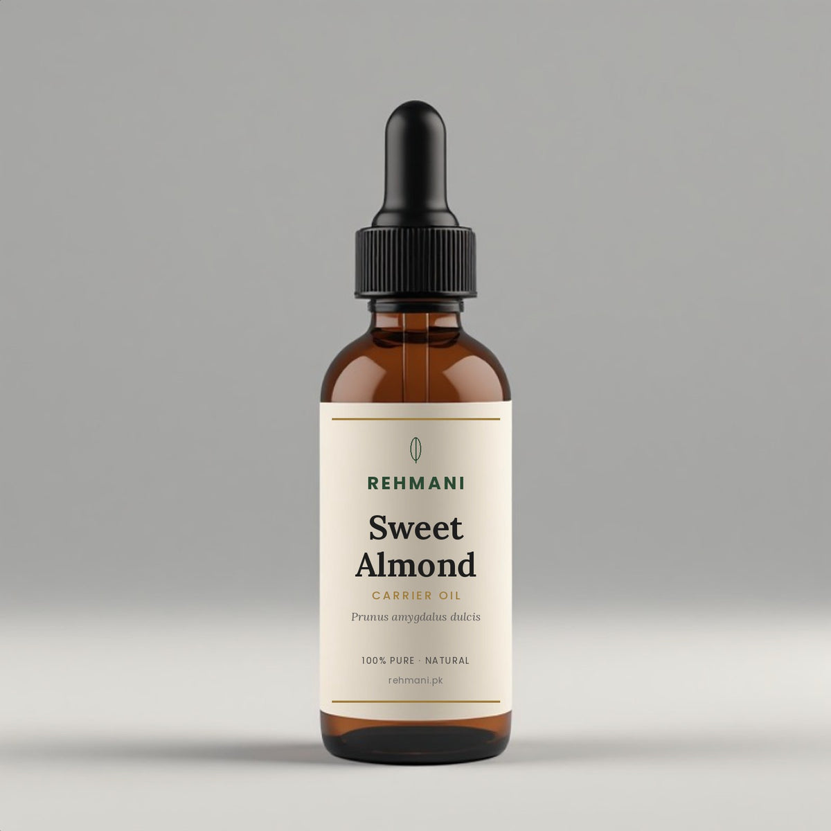 Rehmani Sweet Almond Oil in an amber glass dropper bottle